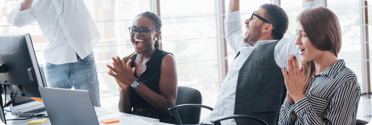 image of team members in office laughing